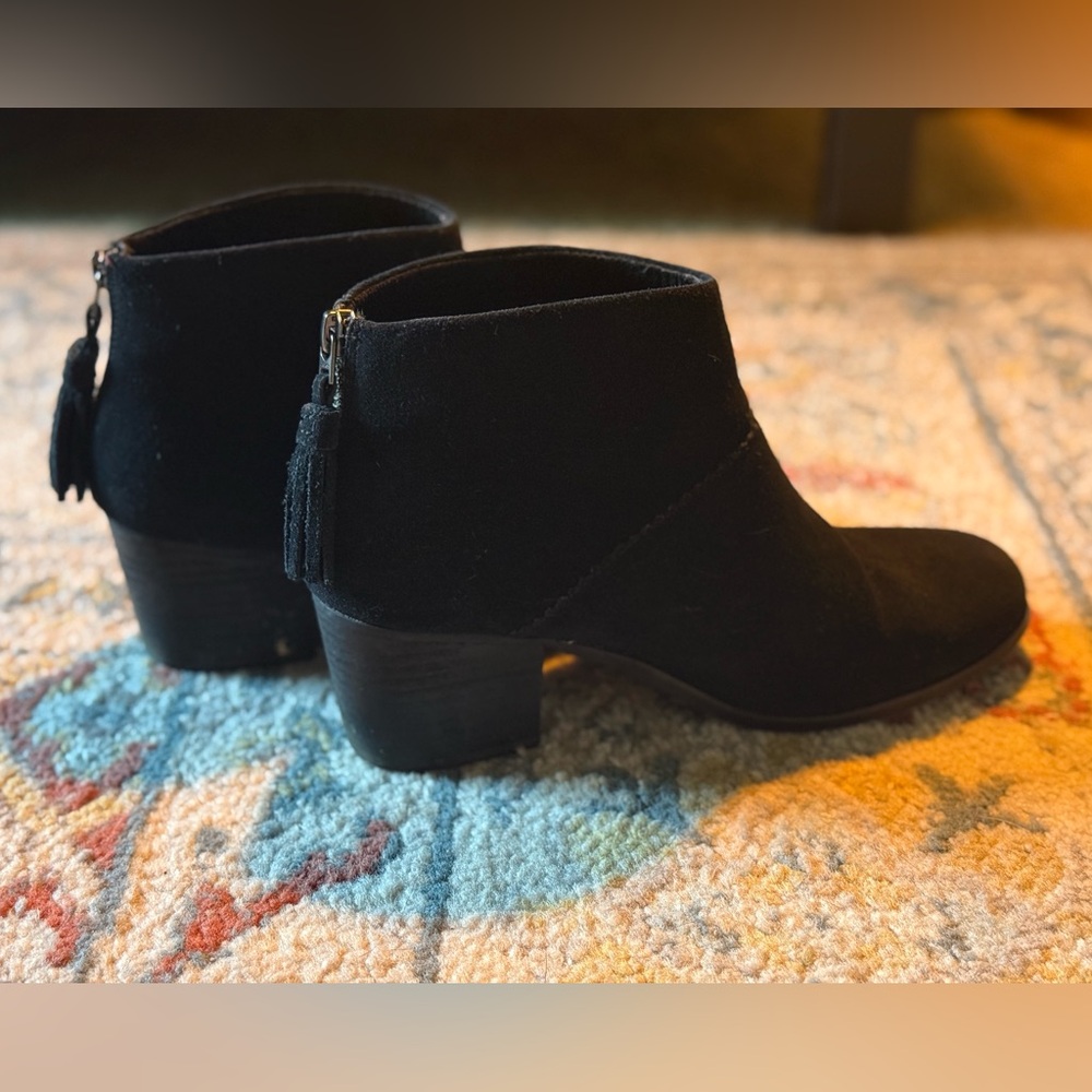 Tom’s zip up black suede booties